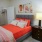 walk-in closet in carpeted bedroom